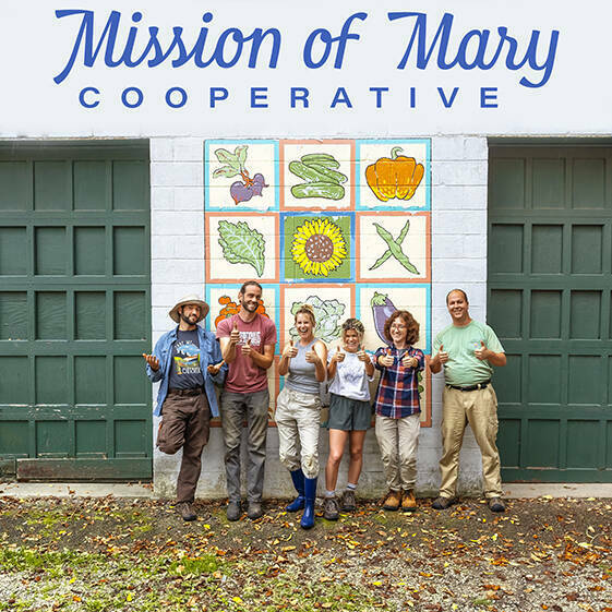 Group of people at the Mission of Mary Cooperative